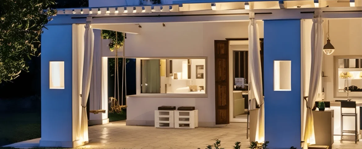 Exterior view of Villa Mia, a premier eco luxury villa in Salento featuring a natural pool, local stone architecture, and sustainable landscaping blending with the Mediterranean nature.