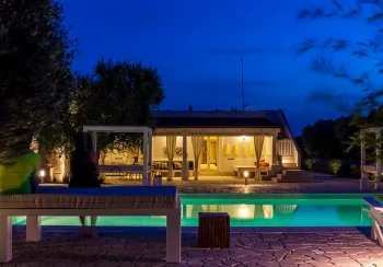 Modern living room interior at Villa Mia, designed as the ultimate luxury base for exploring Lecce, featuring contemporary furniture and high-end amenities for a relaxing stay.