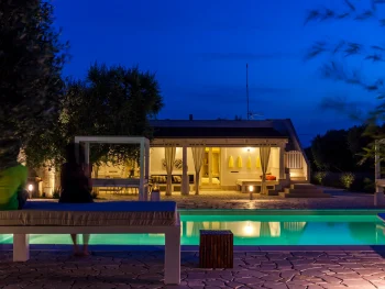 Modern living room interior at Villa Mia, designed as the ultimate luxury base for exploring Lecce, featuring contemporary furniture and high-end amenities for a relaxing stay.